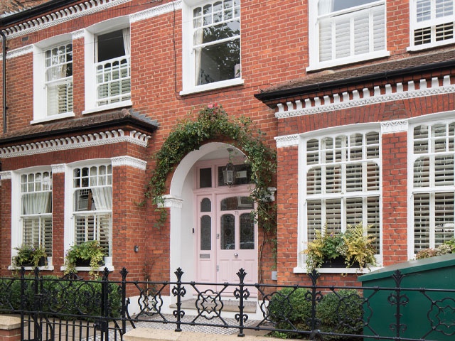 Victorian red-brick front elevation in Balham with restored period front door and repointed brickwork