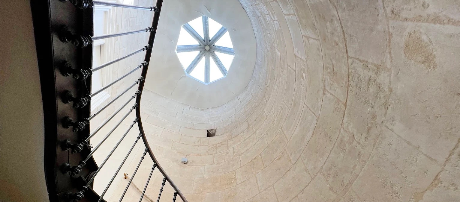 Restored stone spiral staircase and replaced octagonal skylight in a castle