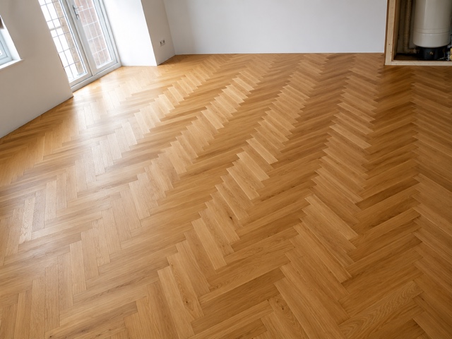 Herringbone oak parquet flooring laid in a bright Oxford room
